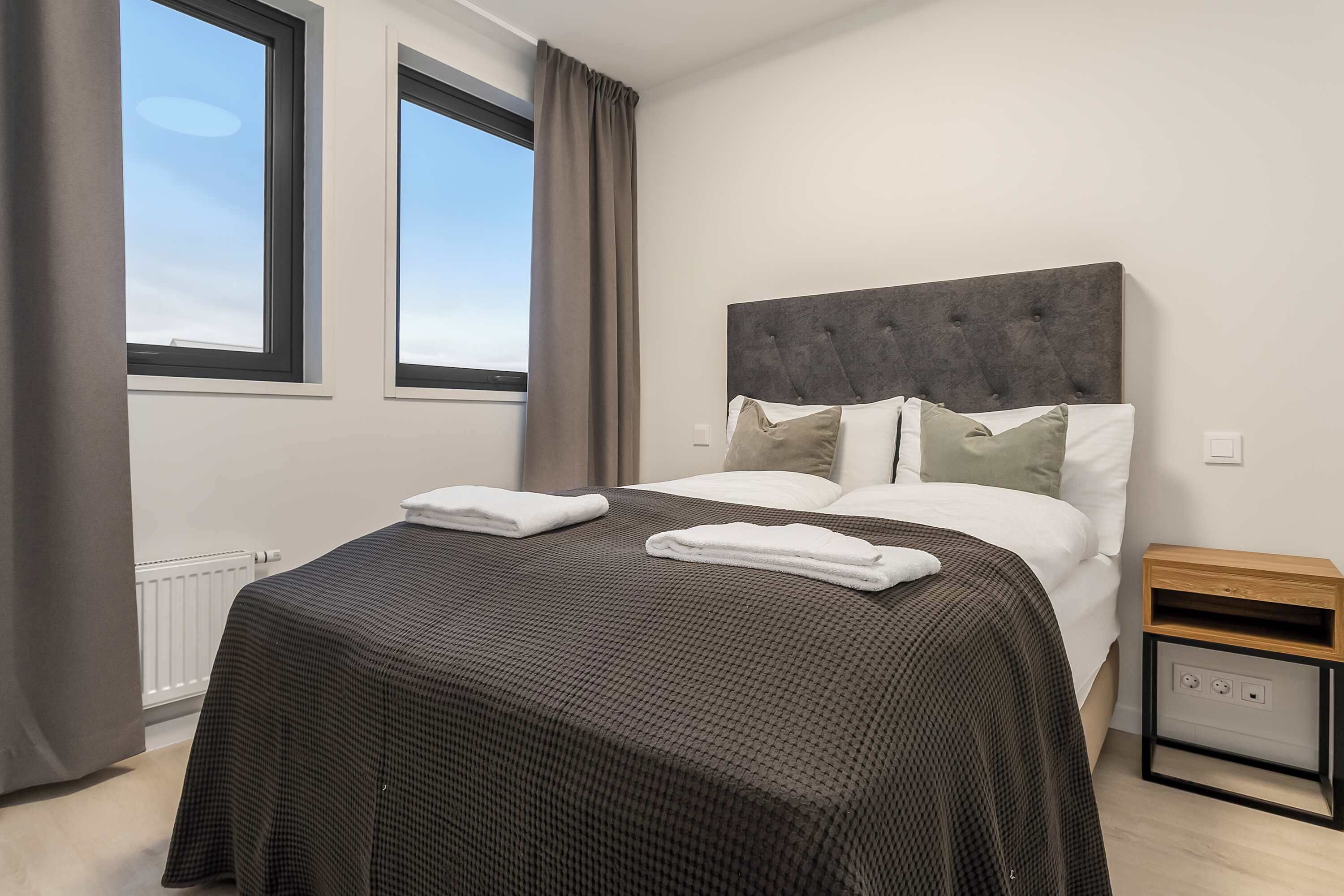 1 غرفة نوم ومكواة/لوح كي وواي فاي وملاءات أسرّة