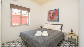 Iron/ironing board, travel crib, free WiFi, bed sheets