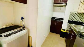 Comfort Condo, 1 Bedroom, Balcony, City View | Private kitchenette | Mini-fridge, microwave, oven, stovetop