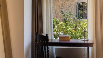 Desk, laptop workspace, blackout curtains, iron/ironing board