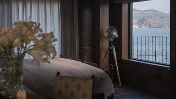 Signature Room, Ocean View | Desk, laptop workspace, blackout drapes, iron/ironing board