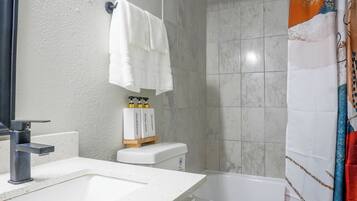 Hair dryer, towels, soap, shampoo