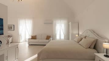 Caixa forta a l'habitació, cortines opaques i planxa i posts de planxar