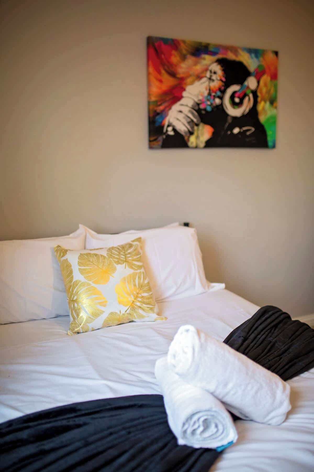 4 bedrooms, iron/ironing board, travel cot, WiFi