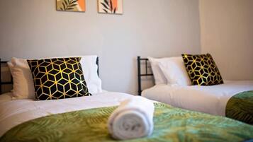 4 habitaciones, tabla de planchar con plancha, cuna de viaje y wifi