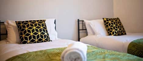 4 bedrooms, iron/ironing board, travel cot, WiFi
