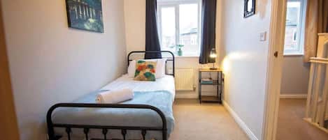 4 bedrooms, iron/ironing board, travel cot, WiFi