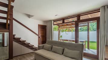 Basic Apartment | Living area | 32-inch Smart TV with digital channels