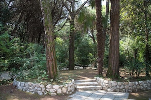 Bungalow, 2 Bedrooms, Patio, Garden View | Garden - Pine-front Bungalow Steps From the Beach (Eraclea)