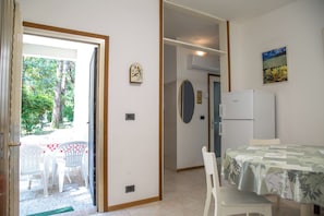 Bungalow, 2 Bedrooms, Patio, Garden View | Dining room - Pine-front Bungalow Steps From the Beach (Eraclea)