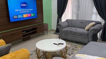 Deluxe Apartment, Balcony, City View | Living area