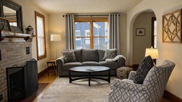 Smart TV, fireplace, DVD player, books