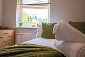 4 bedrooms, iron/ironing board, travel cot, WiFi