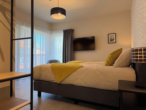 Kamar Double Standar | Wi-Fi gratis dan seprai linen