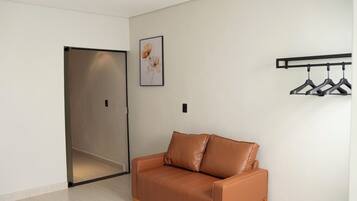 Quarto duplo superluxo | Área de estar | TV