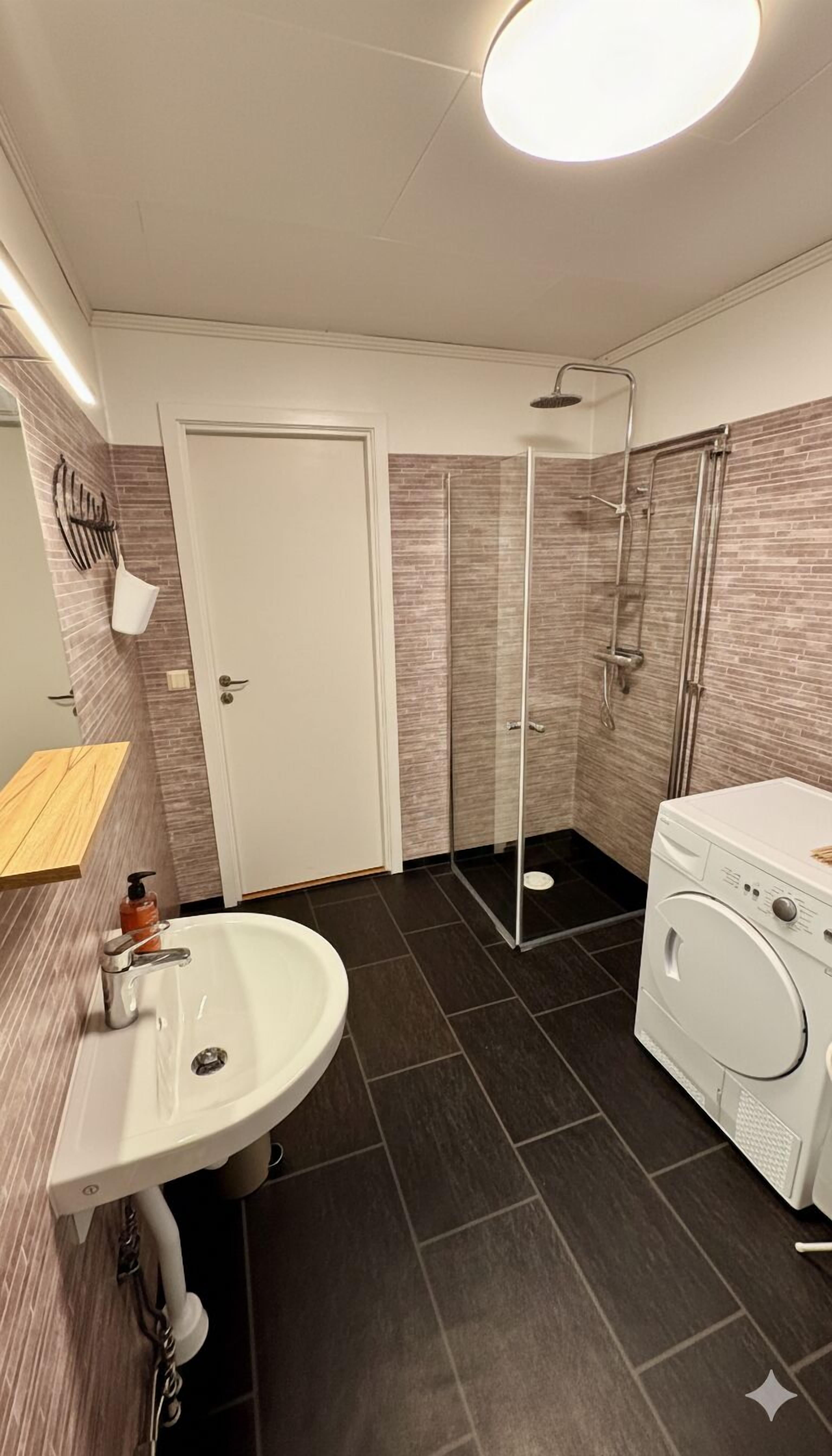 Dusj, håndklær og såpe