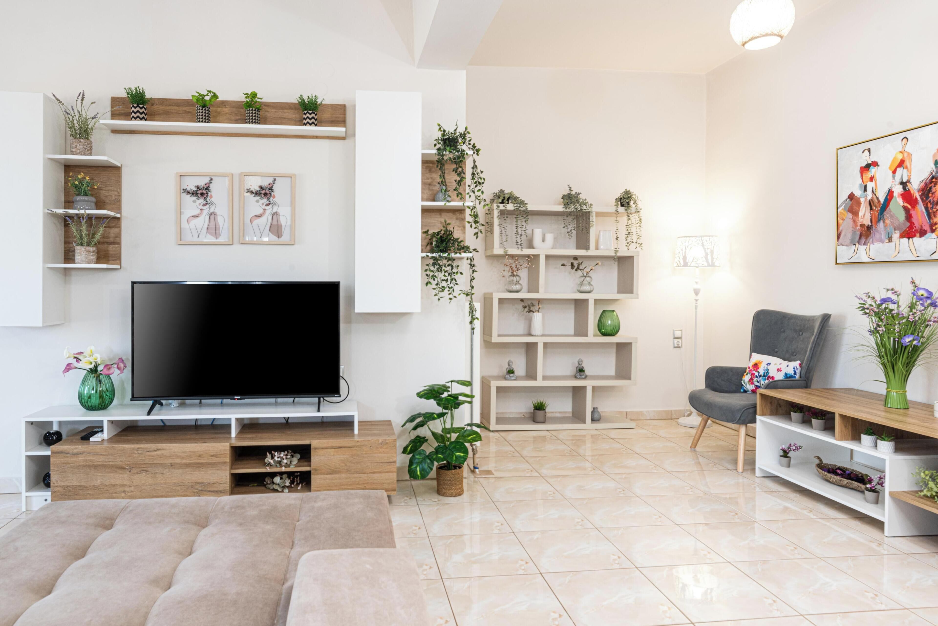 Appartement supérieur, vue sur la montagne | Aire de séjour | Téléviseur connecté de 50 po avec télévision par câble
