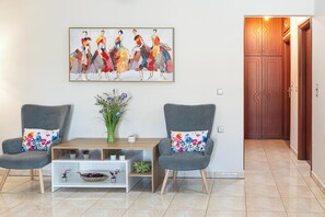 Superior Apartment, Mountain View | Living area | 50-inch Smart TV with cable channels - Lumina Apartment with Shared Pool (Perivolia)