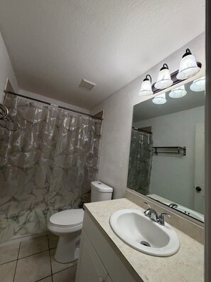 Hair dryer, towels, toilet paper