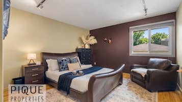 Iron/ironing board, travel crib, free WiFi, bed sheets