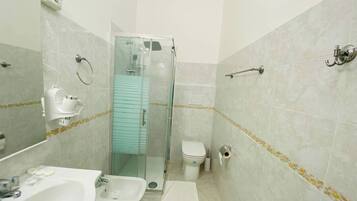 Bathtub, hair dryer, towels, soap