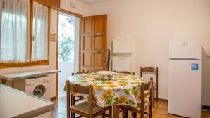 Apartment, 1 Bedroom, Terrace, Garden View | Dining room - Terrace Home by the Pinewood (Eraclea)