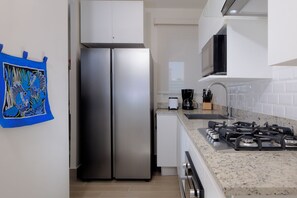 Premium Villa, Garden View | Private kitchen | Fridge, microwave, oven, stovetop - Brisas del Mar by Playa Caracol Resorts (Punta Chame, Panamá, Panamá)