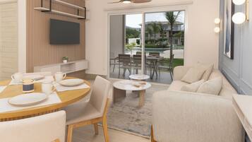 Premium villa, uitzicht op tuin | Woonruimte | Een 50-inch smart-tv met kabelzenders