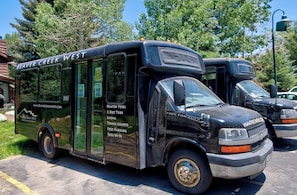 A black bus with "Beaver Creek West" written on the side, indicating it is a tour bus. - Après Haus: 2BD/2BA w/ Pool, Hot Tubs, Sauna & Free Vail + BC Shuttle (Avon)