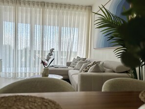 Living area - Caribbean 2BR Apartment - Facing the pool (Punta Cana)