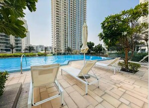 Outdoor pool - Icon Bay Creek Harbour Waterfront Living (Dubai)
