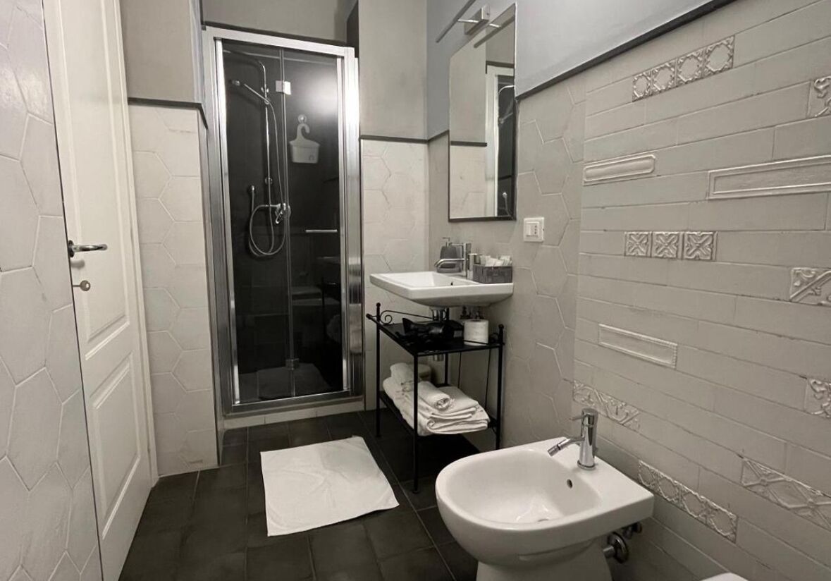 Deluxe Double Room, Garden View | Bathroom | Shower, hair dryer, towels, soap