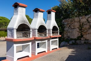 Studio, Balcony | BBQ/picnic Area - Elegant Studio in Sardinian Stone Residence (Palau)