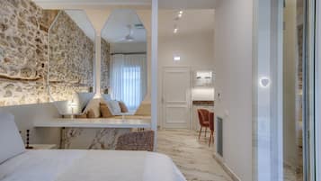 Deluxe Suite, City View | In-room safe, laptop workspace, blackout drapes, soundproofing