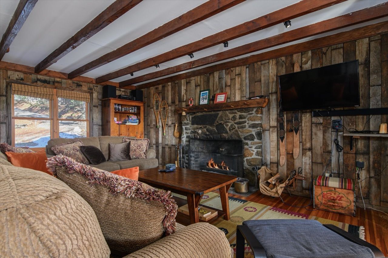 TV, fireplace, books, stereo