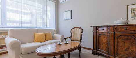 Basic Apartment, Balcony | Living area | 35-cm TV with digital channels