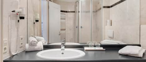 Shower, hair dryer, towels