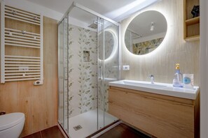 Doccia, bidet, asciugamani