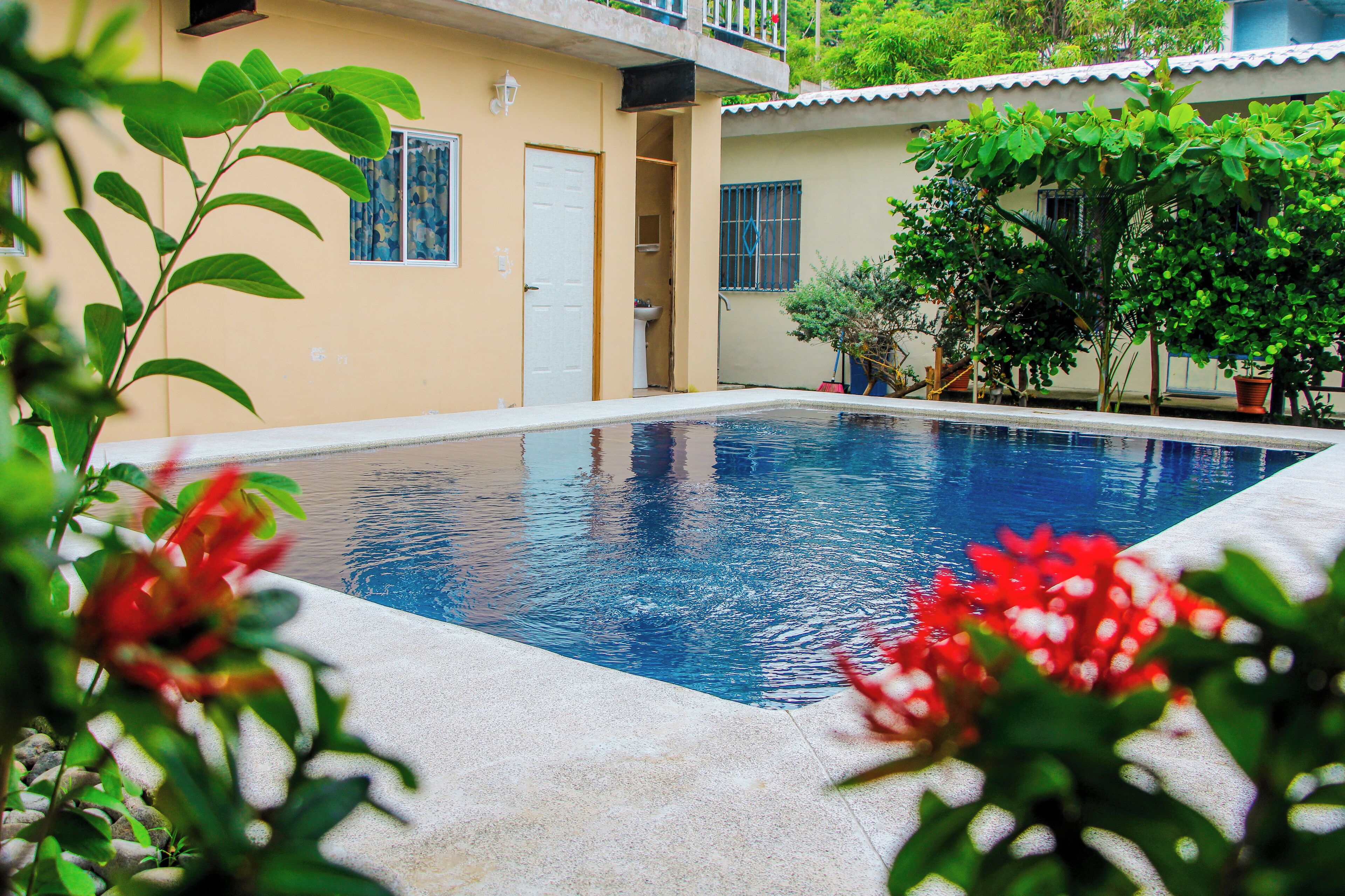 Habitación doble, vista parcial al océano | Área de sala de estar