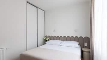 Laptop workspace, blackout drapes, iron/ironing board, cribs/infant beds