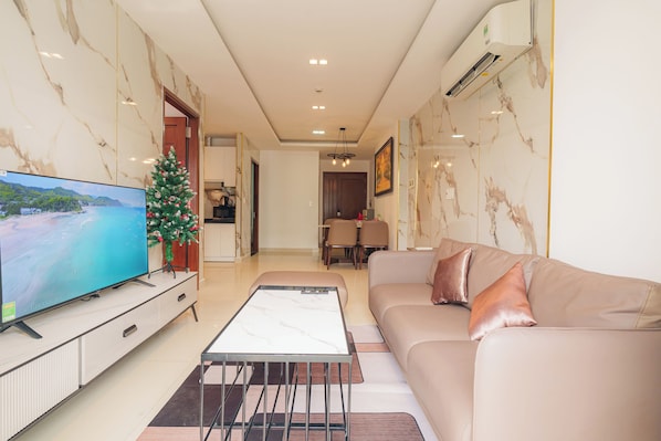 Grand Suite, 1 Bedroom, Club Lounge Access, City View | Egyptian cotton sheets, premium bedding, down comforters - Vertex Luxstay Lumiere Riverside (An Khanh)