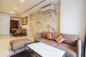 Grand Suite, 1 Bedroom, Club Lounge Access, City View | Egyptian cotton sheets, premium bedding, down comforters - Vertex Luxstay Lumiere Riverside (An Khanh)