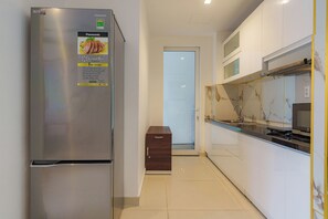 Grand Suite, 1 Bedroom, Club Lounge Access, City View | Egyptian cotton sheets, premium bedding, down comforters - Vertex Luxstay Lumiere Riverside (An Khanh)