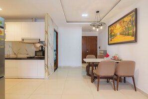 Grand Suite, 1 Bedroom, Club Lounge Access, City View | Egyptian cotton sheets, premium bedding, down comforters - Vertex Luxstay Lumiere Riverside (An Khanh)