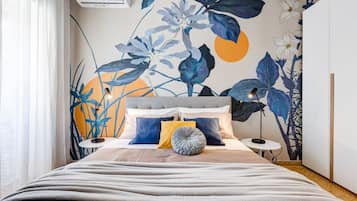 Desk, iron/ironing board, travel cot