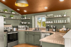 Fridge, microwave, oven, stovetop - Lux Cabin near Breck, Sauna, Hot Tub, Lounge & Bar, Pool & Shuffleboard, Pets (Fairplay)