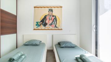 4 slaapkamers, een strijkplank/strijkijzer, wifi, beddengoed