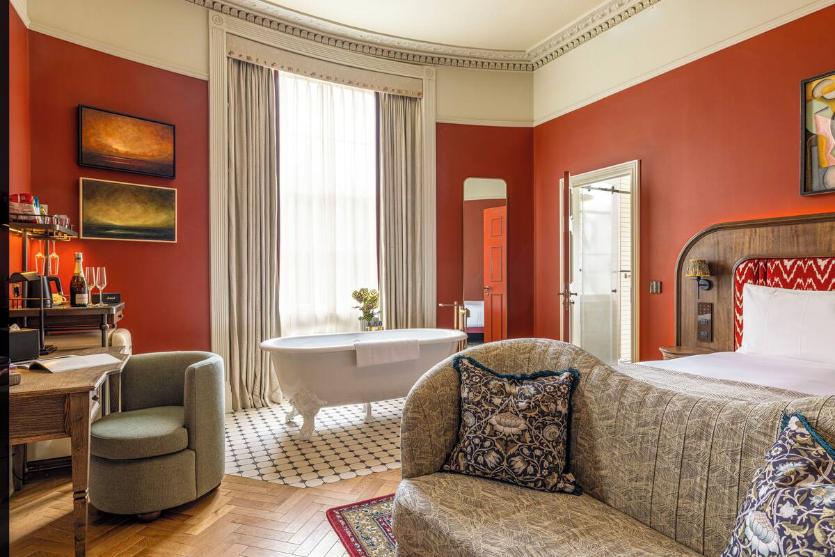 Junior Suite | In-room safe, blackout drapes, iron/ironing board, free WiFi