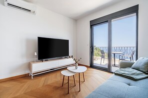 Luxury Apartment, Balcony, Sea View | Living area | Flat-screen TV - The View - Apartment with pool (Sveti Stefan)