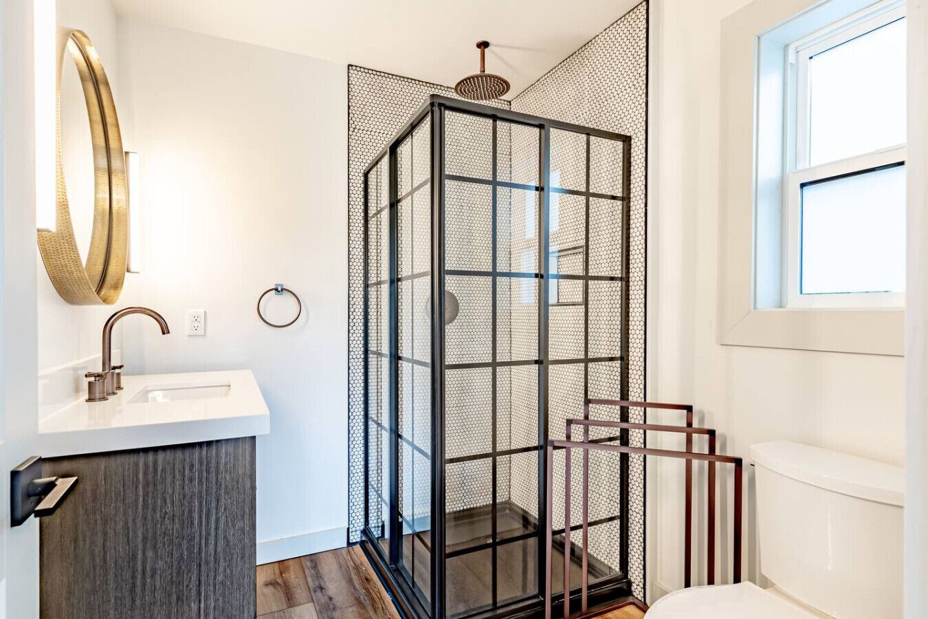 Modern bathroom with walk-in shower and stylish finishes